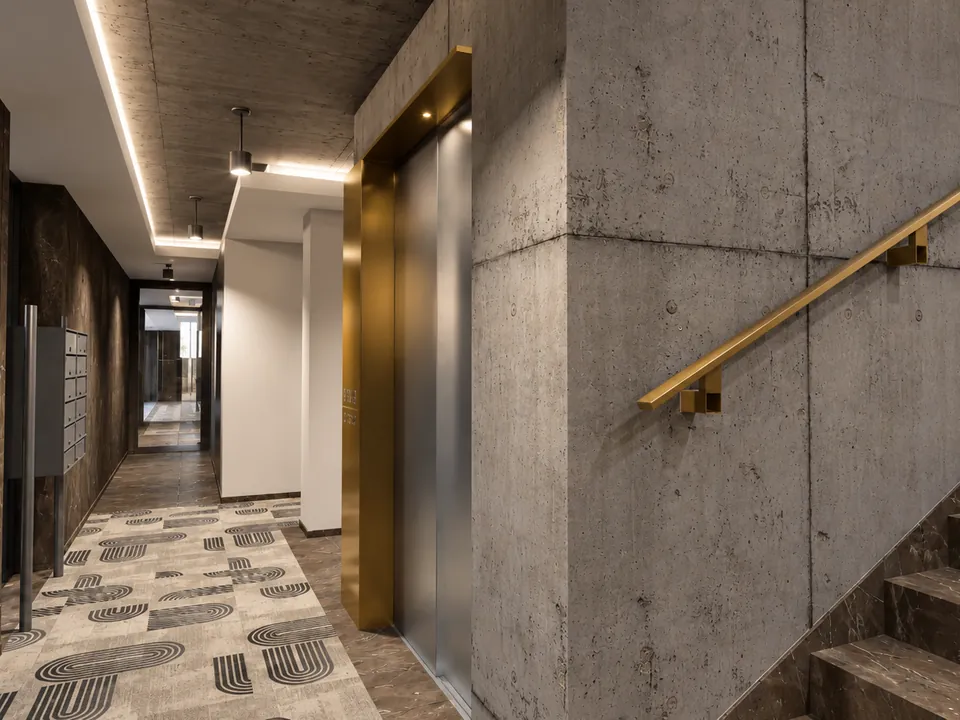 A lépcsőház és a lift sárgaréz részletei